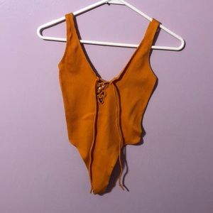 NWT Urban Outfitters Out From Under Seamless Ribbed Orange Bodysuit